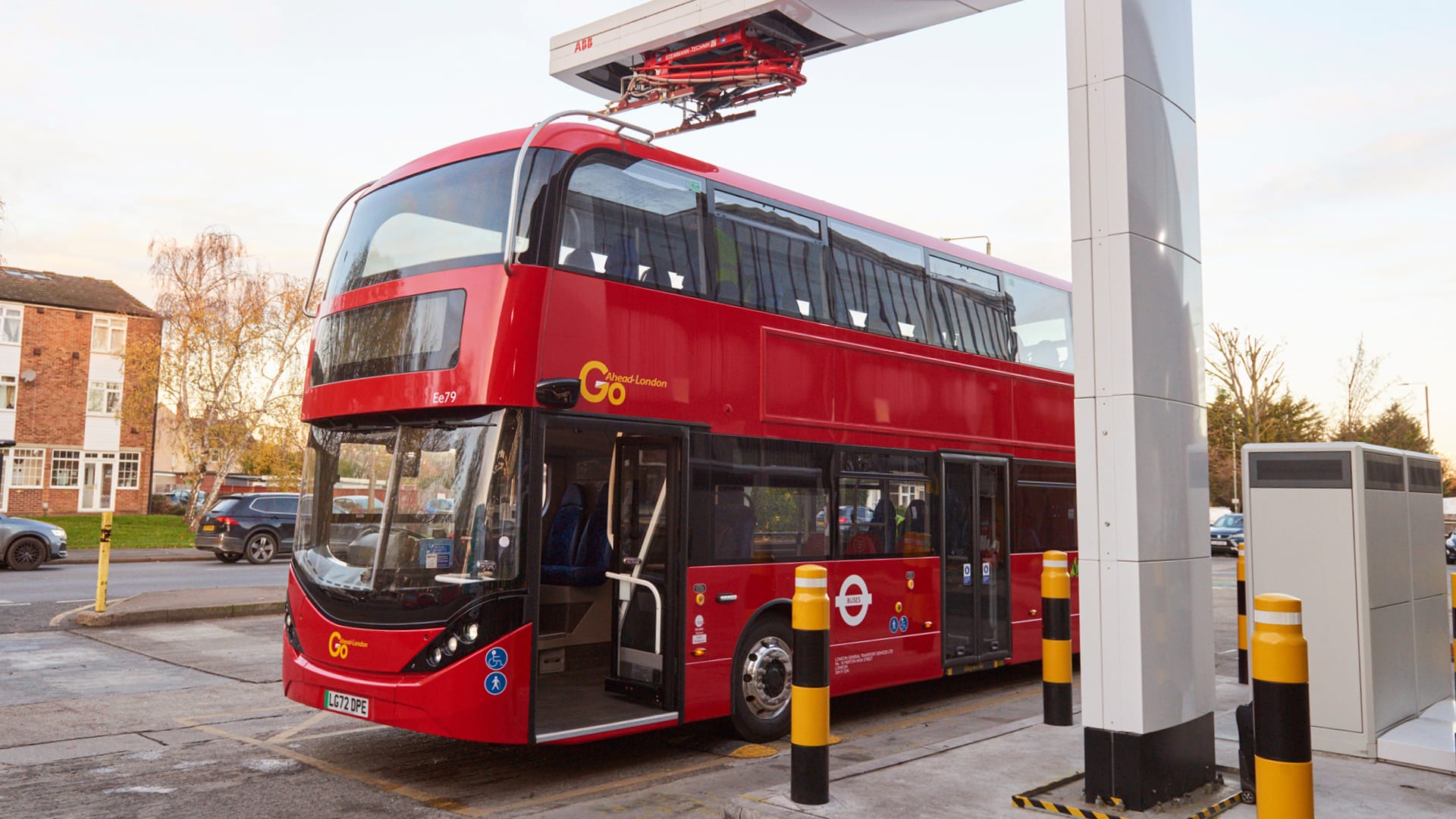 a double decker bus parked at a bus stop